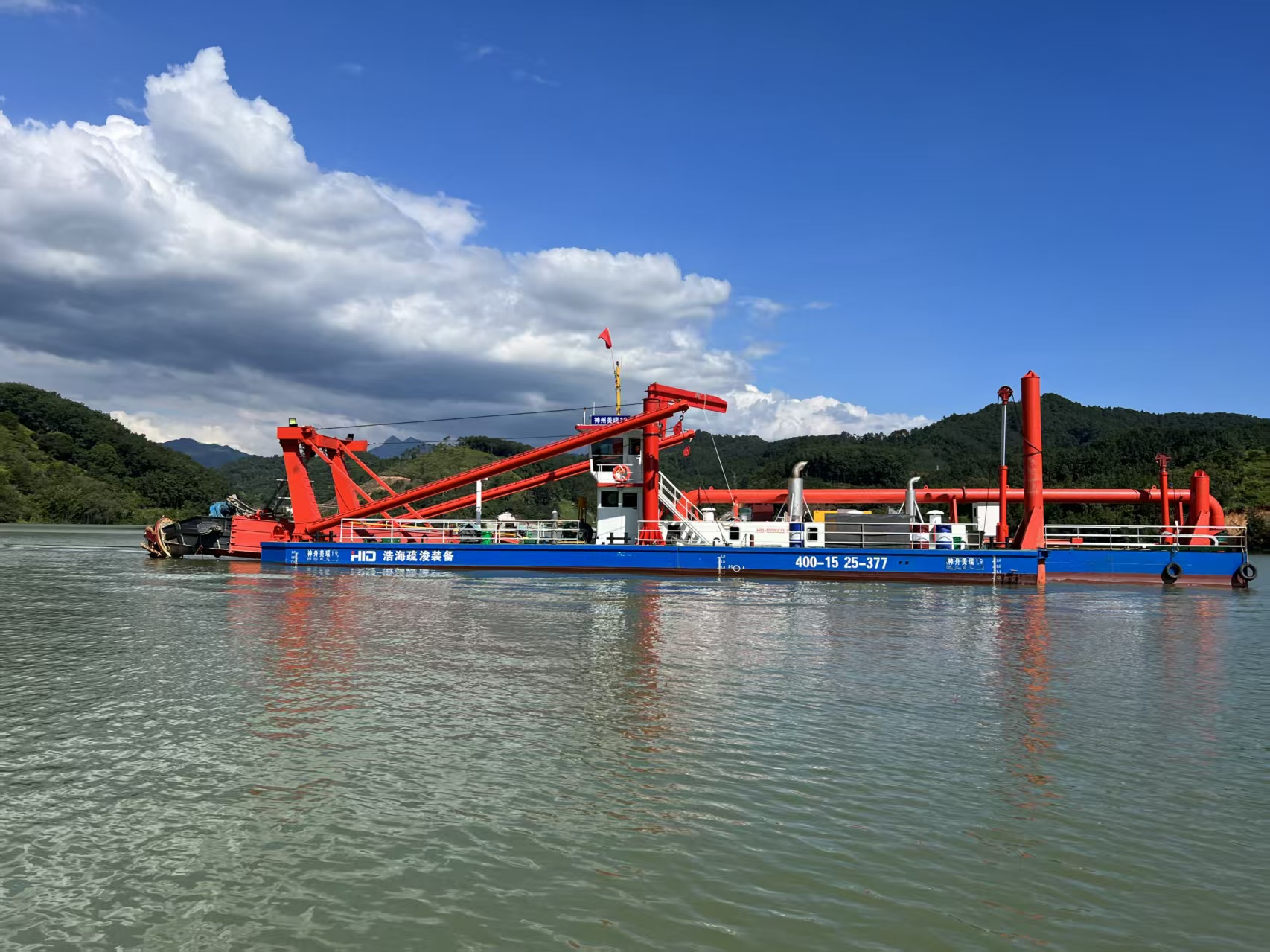 20 Inch with Comins Engine Suction Dredger in The River 