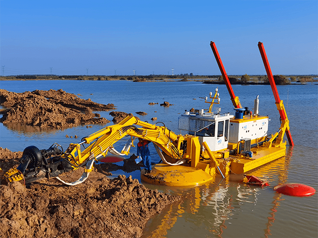 Self-Propelled Amphibious Multipurpose Dredger Suitable for Water and Land Applications