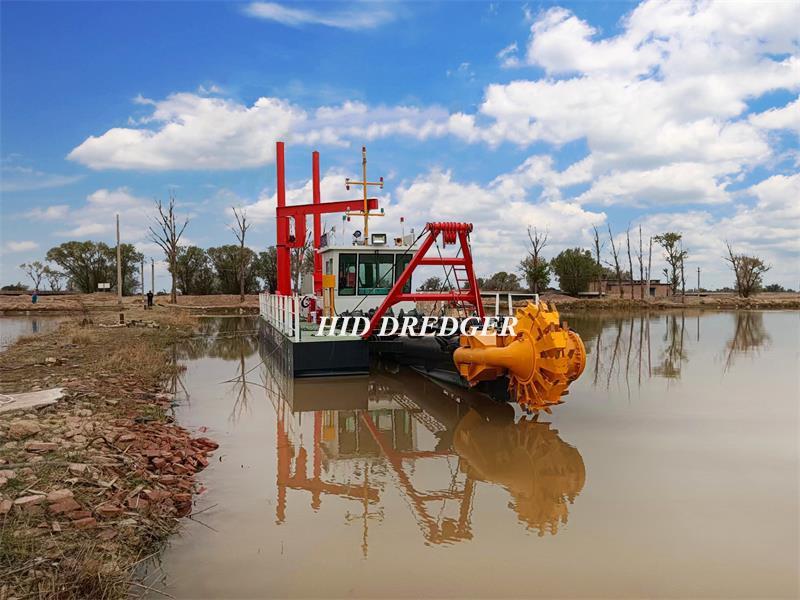 Bucket wheel dredger used for dredging river sand and mud.