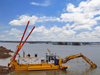Self-Propelled Amphibious Multipurpose Dredger Suitable for Water and Land Applications